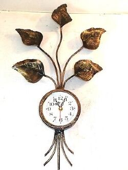 grande-orologio-da-parete-foglie-in-ferro-battuto-oro-al-quarzo573.jpg