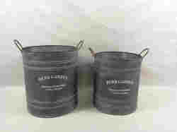 set-di-2-vasi-contenitori-in-ferro-metallico-vintage.jpg